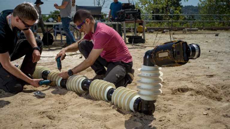 JPL robotics team working with EELS prototype at Mars Yard